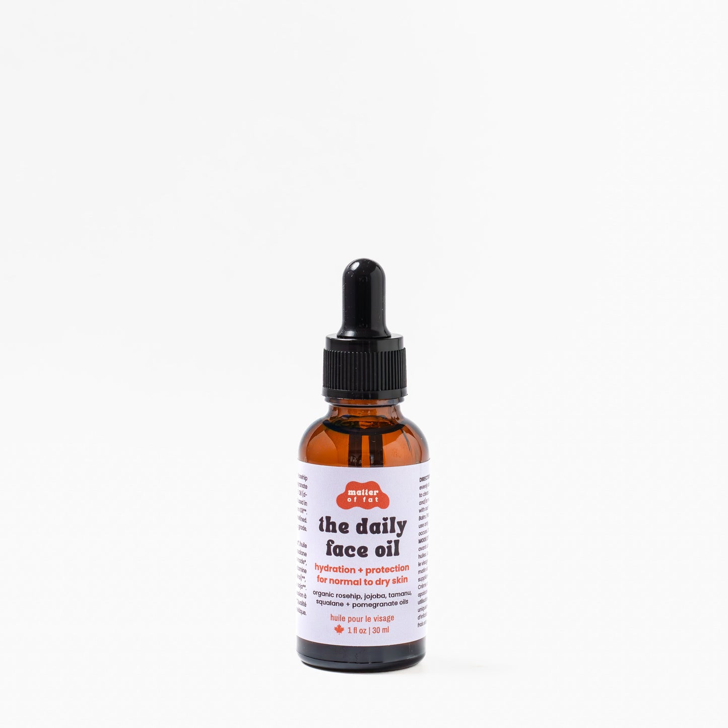 1 ounce glass dropper bottle of 'the daily face oil' on a white background